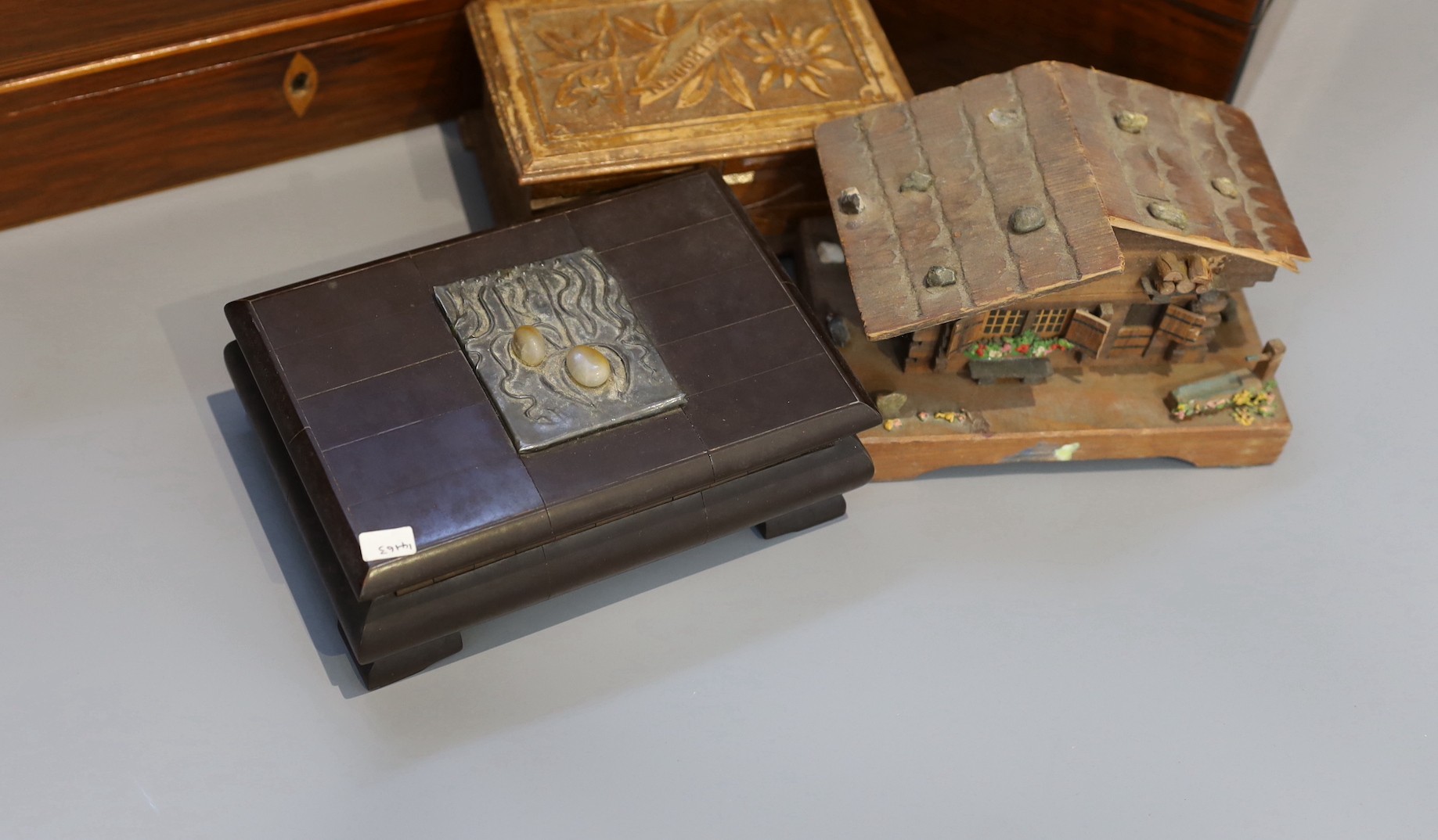 A Victorian mahogany sarcophagus work box, width 30 cms, a Victorian walnut sewing box and three others.